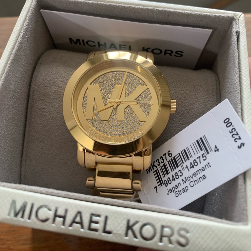 Brand New Michael Kors Women’s Gold watch with diamond face. Never worn/No flaws